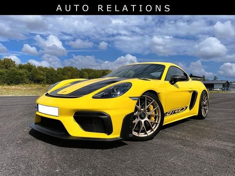Begagnad Porsche 718 Cayman GT4 501 HK (368 kW) 2024 Racing yellow solid Sportkupé