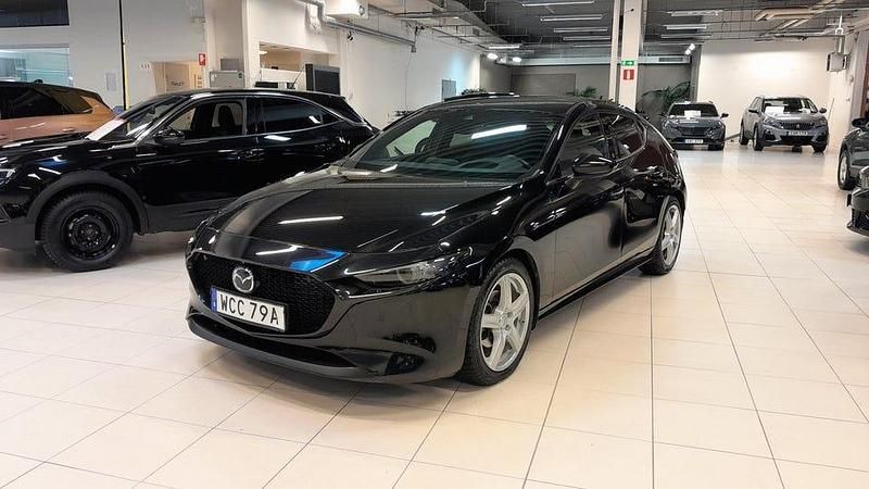 Svart Begagnad 2020 Mazda 3 Cosmo Halvkombi | 239 900 kr (Bra pris) - Bild 1/4