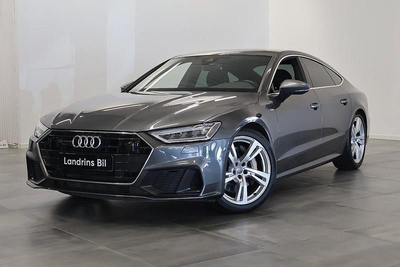 Grå Begagnad 2018 Audi A7 Sportback S-Line Halvkombi | 439 000 kr (Marknadspris) - Bild 1/4