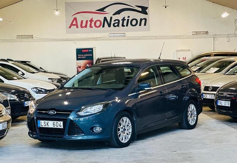 Grå Begagnad 2011 Ford Focus Titanium Kombi | 69 900 kr (Lite dyr) - Bild 1/4