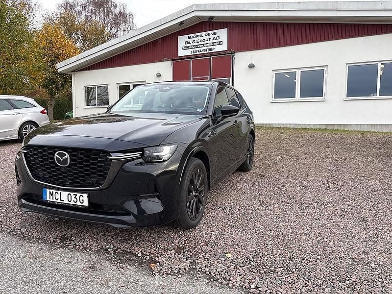 Svart Begagnad 2022 Mazda CX-60 Homura-Line SUV | 339 000 kr (Marknadspris) - Bild 1/4