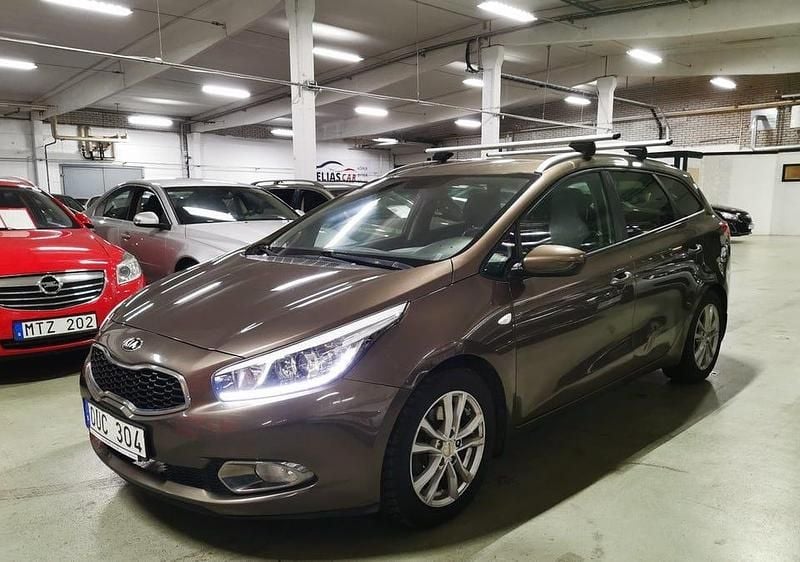 Ljusbrun Begagnad 2013 Kia Ceed Sportswagon EX Kombi | 44 900 kr (Dyr) - Bild 1/4