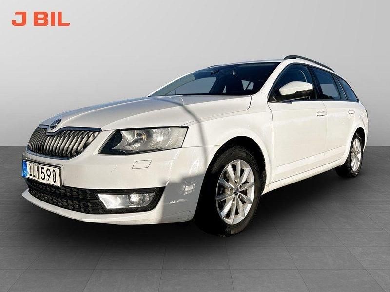 Vit Begagnad 2014 Skoda Octavia Ambition Kombi | 89 900 kr (Marknadspris) - Bild 1/4