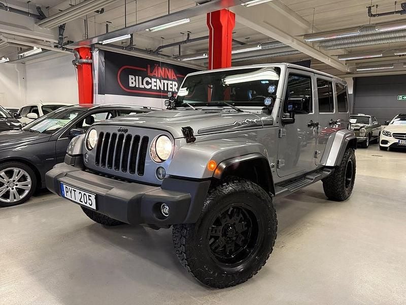 Grå Begagnad 2014 Jeep Wrangler Unlimited SUV | 399 000 kr (Lite dyr) - Bild 1/4
