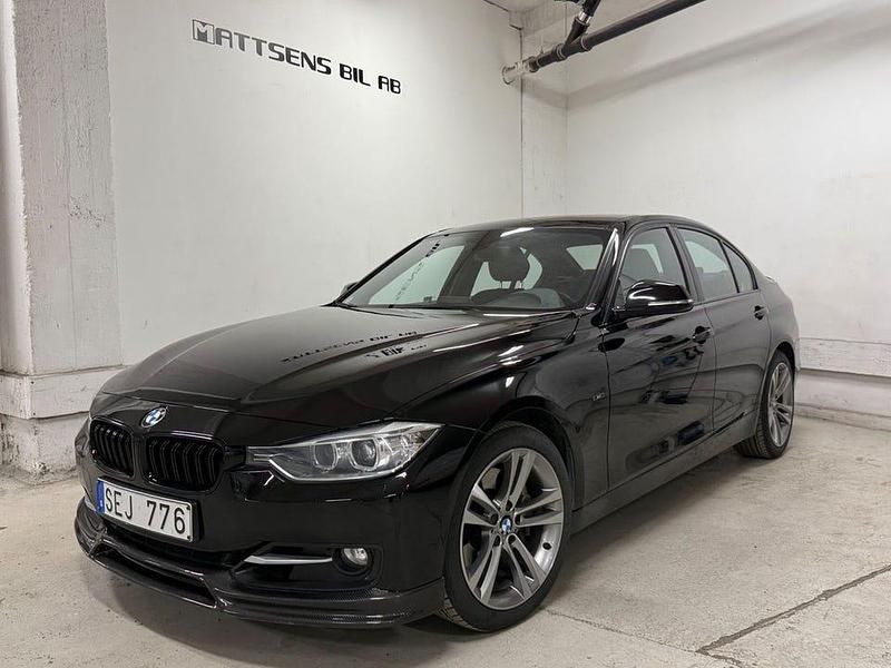 Svart Begagnad 2012 BMW 335 Sport Line Sedan | 139 900 kr - Bild 1/4