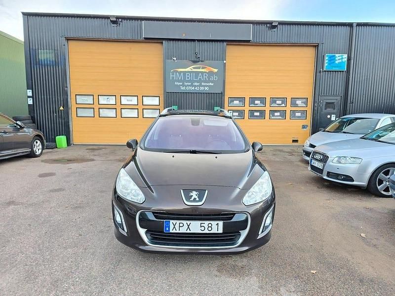 Begagnad Peugeot 308 SW 112 HK (82 kW) 2012 Brun Kombi