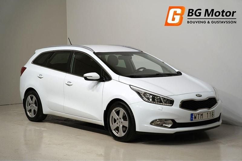 Vit Begagnad 2013 Kia Ceed Comfort Kombi | 94 900 kr (Marknadspris) - Bild 1/4