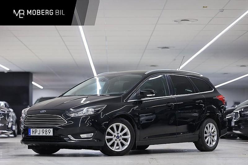 Svart Begagnad 2014 Ford Focus Titanium Kombi | 79 900 kr (Marknadspris) - Bild 1/2