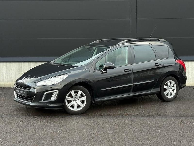 Begagnad Peugeot 308 SW 112 HK (82 kW) 2011 Svart Kombi