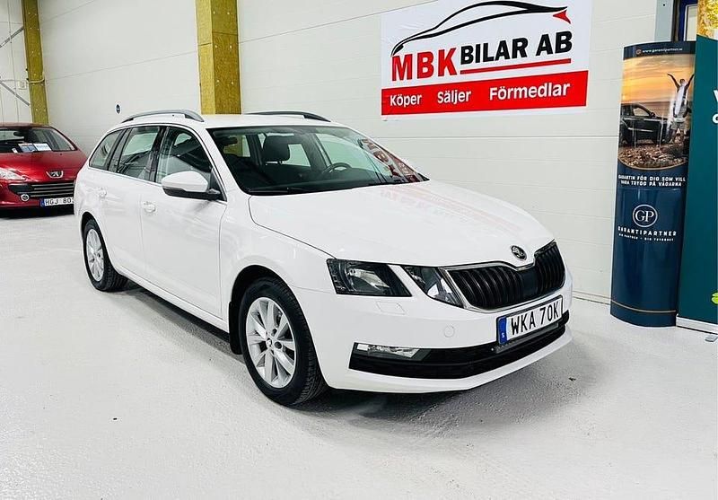 Vit Begagnad 2019 Skoda Octavia G-TEC Ambition Kombi | 134 900 kr (Marknadspris) - Bild 1/4