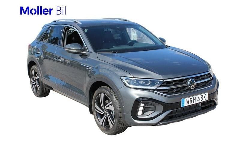 Grå (indium grey metallic) Ny 2025 VW T-Roc R-line SUV | 364 900 kr (Superpris) - Bild 1/4