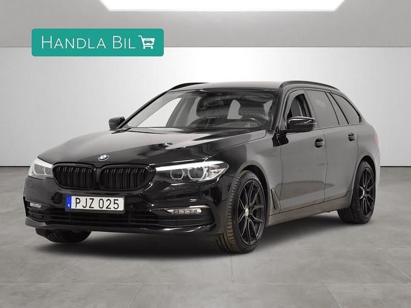 Svart Begagnad 2017 BMW 520 Kombi | 199 800 kr (Marknadspris) - Bild 1/4