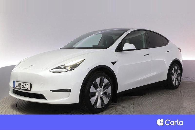 Vit Begagnad 2023 Tesla Model Y Long Range AWD SUV | 461 900 kr - Bild 1/4
