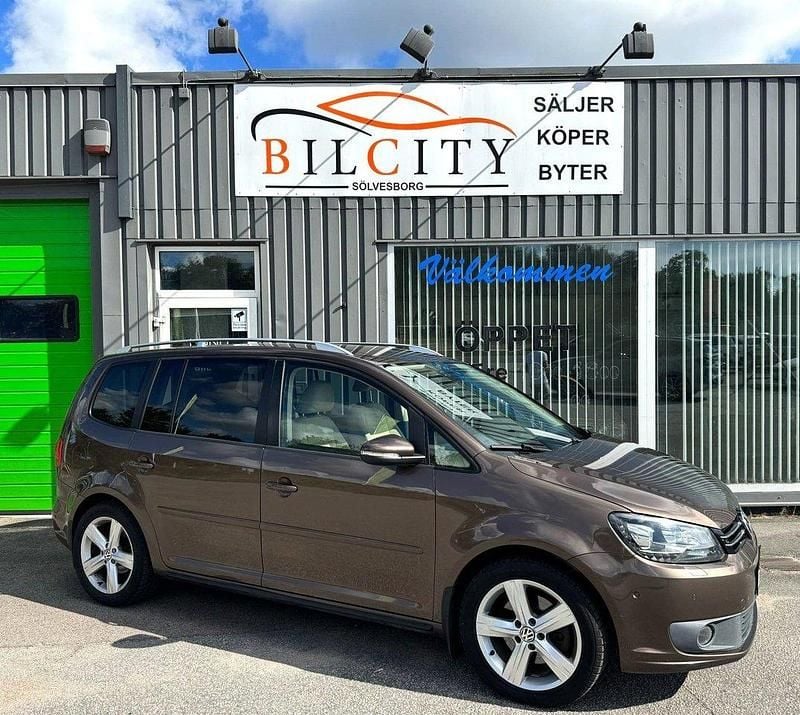 Brun Begagnad 2012 VW Touran Minibuss | 79 900 kr (Marknadspris) - Bild 1/4