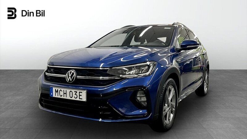 Blå (reef blue metallic) Begagnad 2022 VW Taigo R-line SUV | 269 900 kr (Marknadspris) - Bild 1/4