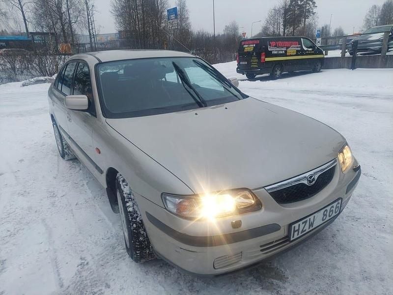Begagnad Mazda 626 116 HK (85 kW) 1999 Brun Halvkombi