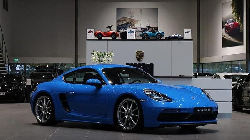 Blå Begagnad 2024 Porsche 718 Cayman GTS Sportkupé | 1 049 000 kr - Bild 1/4