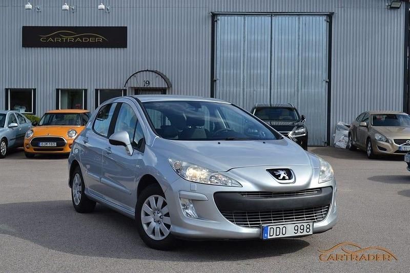 Ljusgrå (grå) Begagnad 2009 Peugeot 308 Halvkombi | 39 900 kr (Lite dyr) - Bild 1/4
