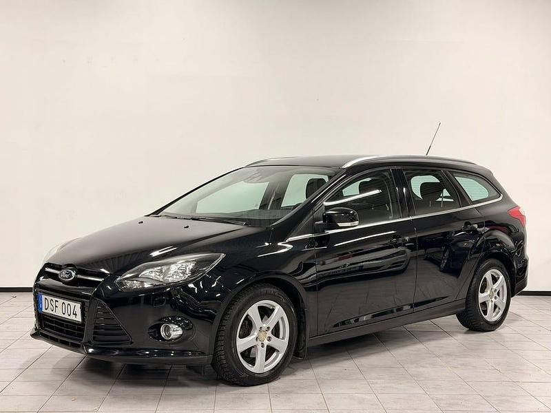 Begagnad Ford Focus Titanium 125 HK (91 kW) 2013 Svart Kombi