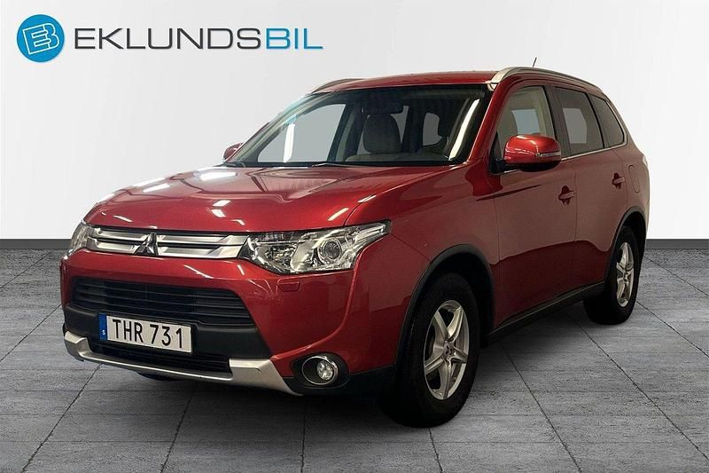 Mörkröd Begagnad 2014 Mitsubishi Outlander SUV | 99 900 kr (Marknadspris) - Bild 1/4