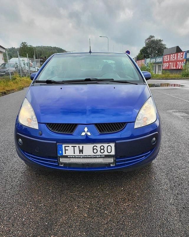 Begagnad Mitsubishi Colt 109 HK (80 kW) 2007 Blå Cab