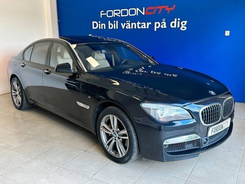Svart Begagnad 2010 BMW 760 M Sport Sedan | 499 900 kr - Bild 1/4