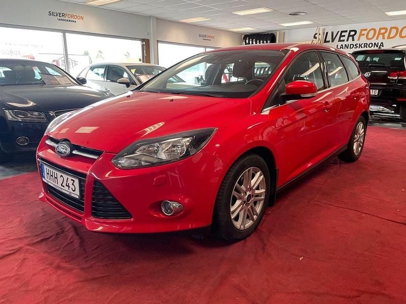 Röd Begagnad 2014 Ford Focus Titanium Kombi | 74 900 kr (Marknadspris) - Bild 1/4