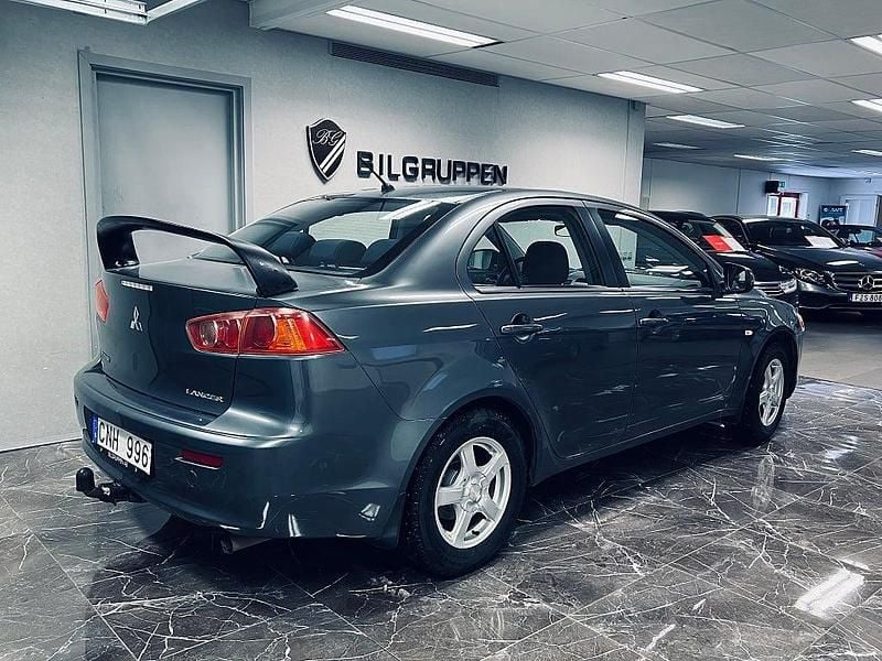 Begagnad Mitsubishi Lancer Inform 143 HK (105 kW) 2008 Grå Sedan