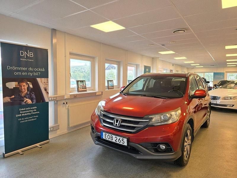 Röd Begagnad 2013 Honda CR-V SUV | 99 900 kr (Marknadspris) - Bild 1/4