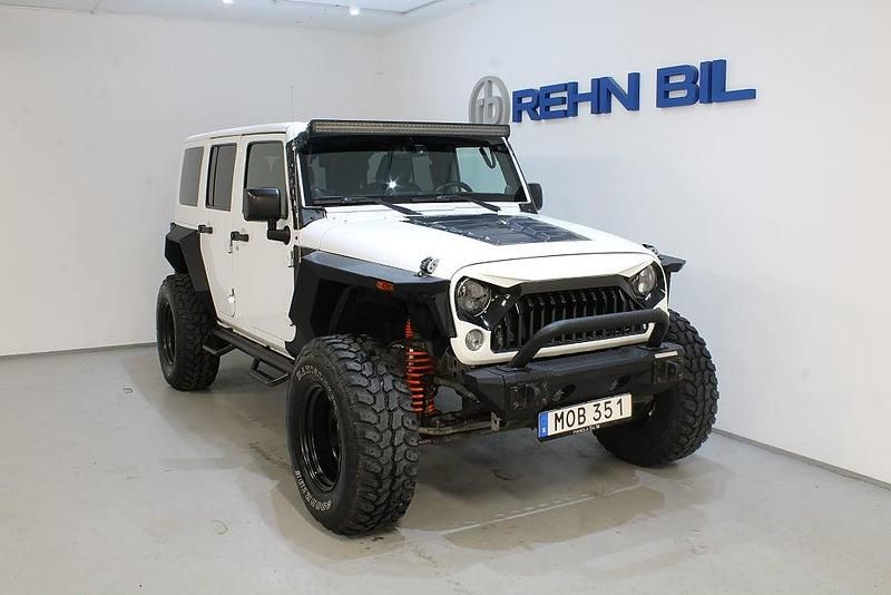 Vit Begagnad 2014 Jeep Wrangler Unlimited SUV | 359 000 kr (Lite dyr) - Bild 1/4