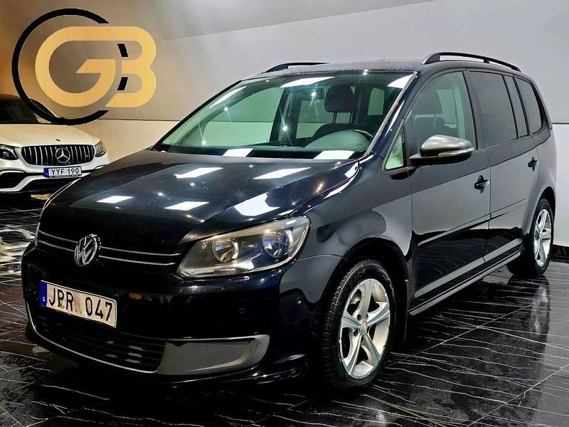 Svart Begagnad 2012 VW Touran Minibuss | 89 900 kr (Marknadspris) - Bild 1/4