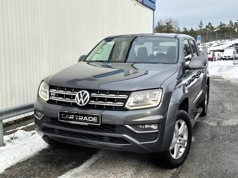 Grå Begagnad 2017 VW Amarok Highline Pickup | 199 900 kr - Bild 1/4