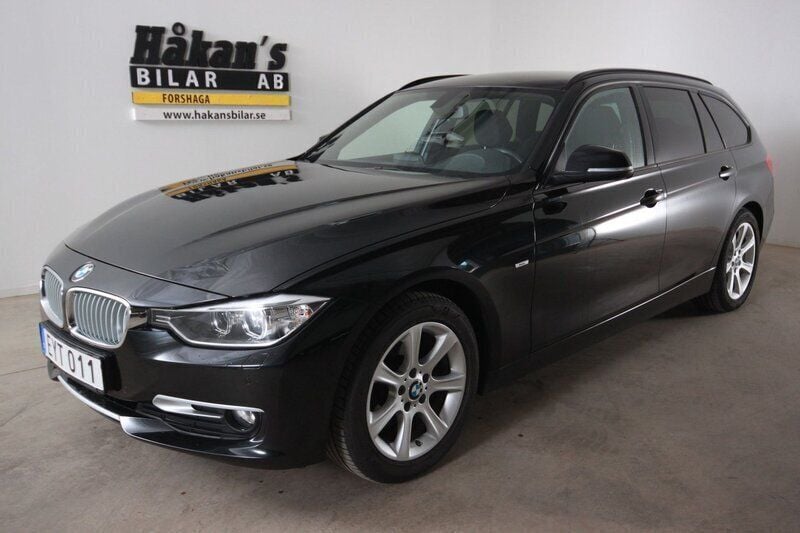 Svart Begagnad 2015 BMW 318 Kombi | 159 500 kr (Marknadspris) - Bild 1/2