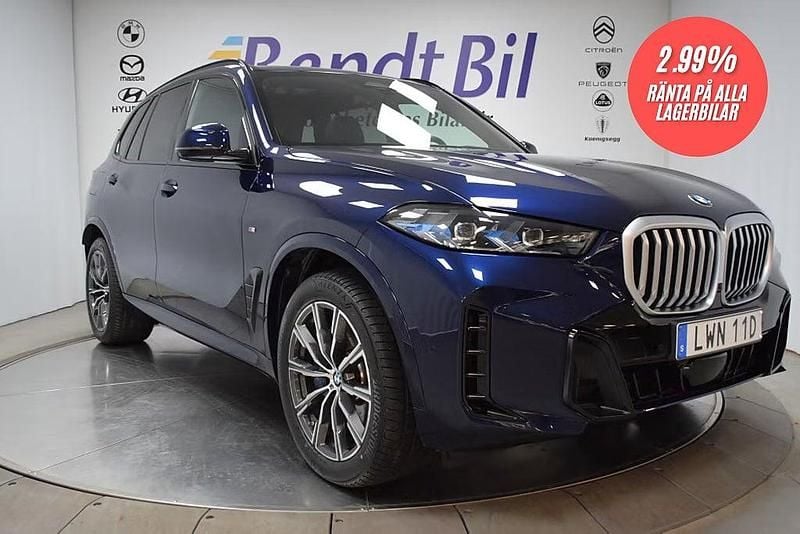 Blå Begagnad 2024 BMW X5 M Sport SUV | 899 500 kr (Marknadspris) - Bild 1/4