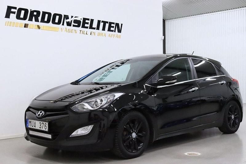 Svart Begagnad 2012 Hyundai i30 Premium Halvkombi | 59 900 kr (Marknadspris) - Bild 1/4