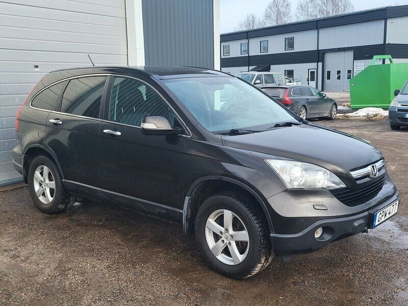 Mörkbrun (brun) Begagnad 2008 Honda CR-V SUV | 59 000 kr (Marknadspris) - Bild 1/4