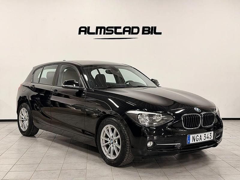 Begagnad BMW 118 Sport Line 143 HK (105 kW) 2012 Svart Halvkombi