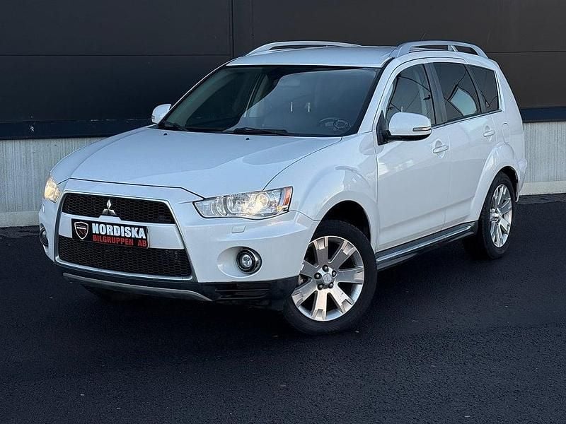 Vit Begagnad 2009 Mitsubishi Outlander SUV | 54 800 kr (Marknadspris) - Bild 1/4