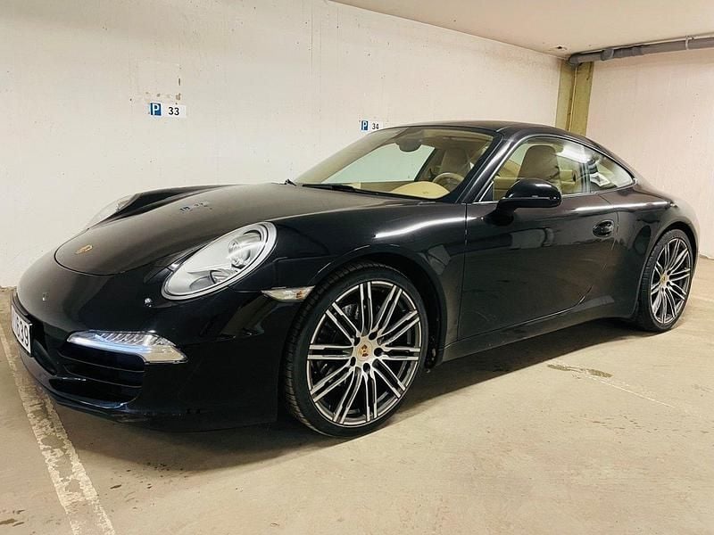 Svart Begagnad 2012 Porsche 991 Sport Sportkupé | 799 000 kr - Bild 1/4