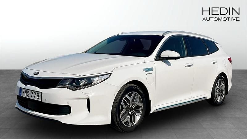 Vit (white) Begagnad 2018 Kia Optima Hybrid 2 Sedan | 184 900 kr (Marknadspris) - Bild 1/4