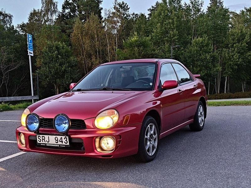 Röd Begagnad 2002 Subaru Impreza Sedan | 50 000 kr (Marknadspris) - Bild 1/4