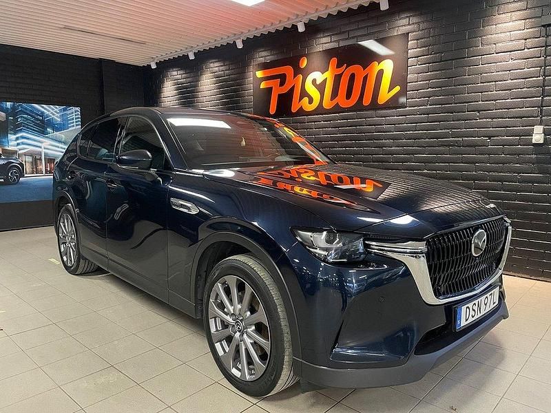 Blå Begagnad 2022 Mazda CX-60 Homura-Line SUV | 329 001 kr (Marknadspris) - Bild 1/4