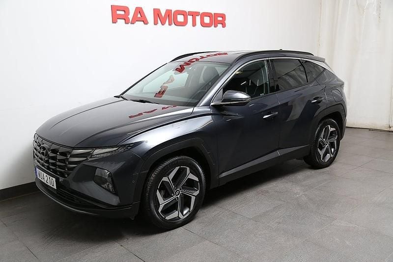 Grå Begagnad 2022 Hyundai Tucson Advanced SUV | 318 800 kr (Marknadspris) - Bild 1/3