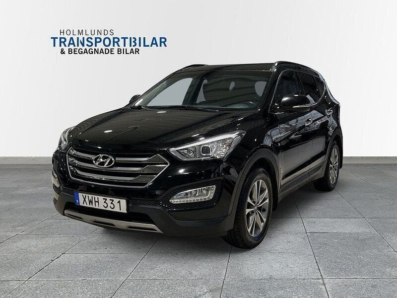 Svart Begagnad 2015 Hyundai Santa Fe Premium SUV | 159 900 kr (Marknadspris) - Bild 1/4