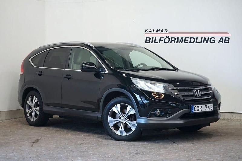 Svart Begagnad 2013 Honda CR-V Executive SUV | 99 500 kr (Marknadspris) - Bild 1/4