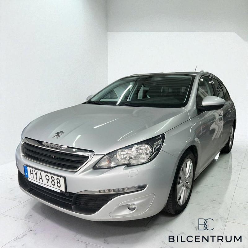 Ljusgrå (grå) Begagnad 2015 Peugeot 308 Active Kombi | 85 900 kr (Marknadspris) - Bild 1/4