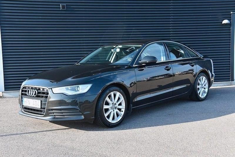 Svart Begagnad 2012 Audi A6 Ambition Sedan | 104 900 kr (Marknadspris) - Bild 1/4