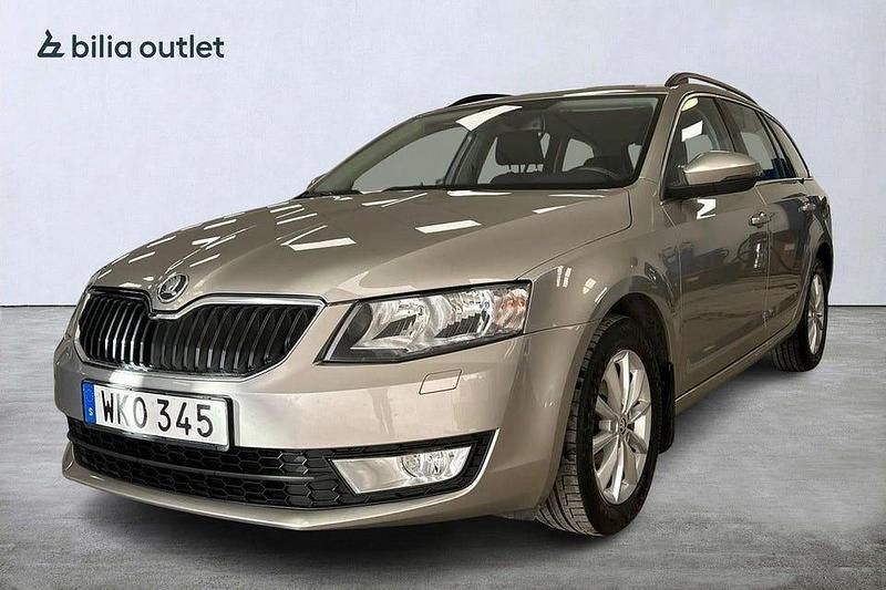 Brun Begagnad 2014 Skoda Octavia Ambition Kombi | 119 000 kr (Marknadspris) - Bild 1/3