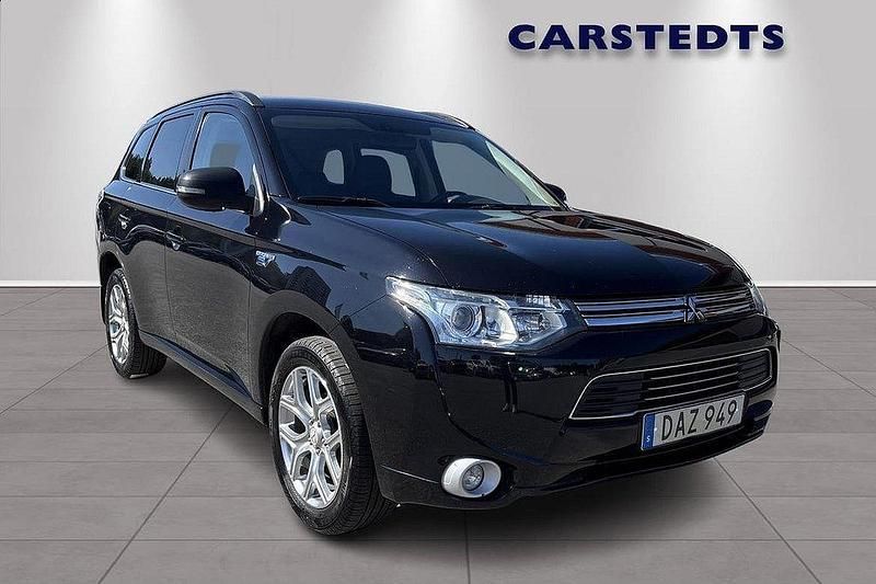 Svart Begagnad 2014 Mitsubishi Outlander P-HEV SUV | 125 500 kr (Marknadspris) - Bild 1/4