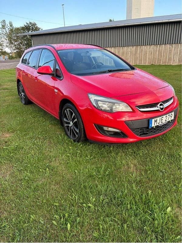 Röd Begagnad 2014 Opel Astra Enjoy Kombi | 44 000 kr (Marknadspris) - Bild 1/4